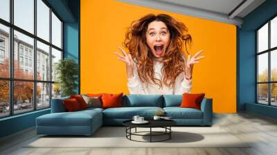 Screaming young woman standing isolated Wall mural