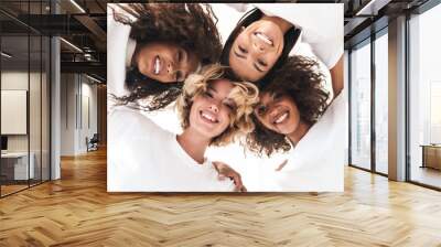 Women multiracial friends looking at camera. Wall mural