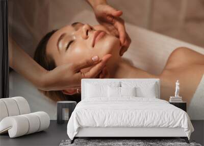 Young woman getting spa treatment Wall mural