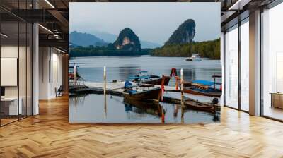 Traditional Thai boats on the ocean beach. Wall mural