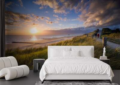 sunset at the beach near the village of Zoutelande on the coast of the province Zeeland Wall mural