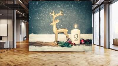 burning candle from 2 nd advent in front of vintage background and decorative christmas background in snow Wall mural