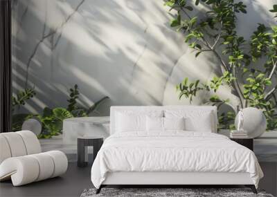 A white marble podium in a 3D-rendered summer scene, accented with green plants and abstract stone elements, ideal for elegant product displays Wall mural