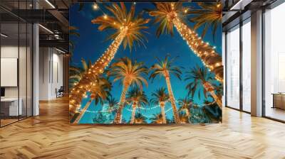 palm trees decorated with festive and bright garlands in the evening Wall mural