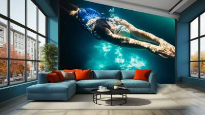 Female swimmer at the swimming pool.Underwater photo. Wall mural