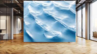 A light blue background with ripples of water, top view Wall mural