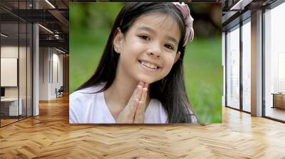 Cute Minority Female In Prayer Wall mural