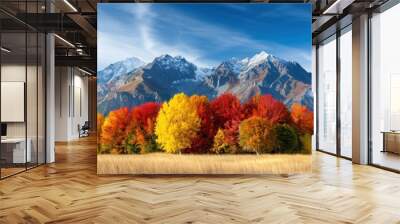 A panoramic view of mountains covered in autumn foliage Wall mural