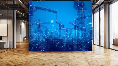 Construction cranes at night in a city skyline with network connections. Wall mural