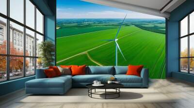 Aerial capture of wind turbines in vibrant green fields, effectively harnessing renewable energy under clear blue skies Wall mural