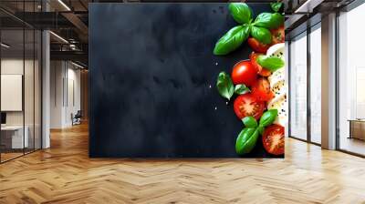 Colorful mozzarella and cherry tomato salad with fresh basil elegantly displayed on dark textured background Wall mural