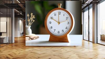 Elegant minimalist clock design featuring a white face, gold hands, and a wooden frame, ideal for enhancing home decor and maintaining precise timekeeping. Wall mural