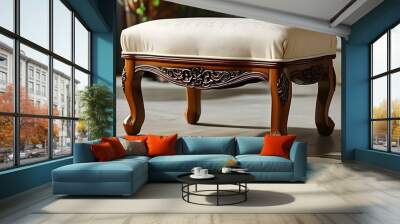 Elegant wooden footstool with cushioned top, complementing traditional interior design styles Wall mural