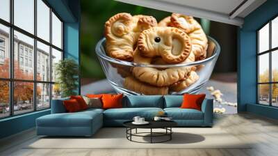 Homemade palmier puff pastry cookies served elegantly in a glass bowl Wall mural