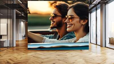 Joyful young couple enjoying a drive in their new car, captured in a side view portrait Wall mural