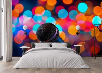 Vibrant Close-Up of Microphone on Stage Surrounded by Colorful Bokeh Lights, Capturing Energetic Atmosphere of Live Music and Karaoke Events Wall mural