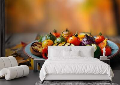 Vibrant grilled vegetables on a plate set against a blurred autumn backdrop, showcasing healthy eating, outdoor cooking, and the essence of a vegan lifestyle. Wall mural