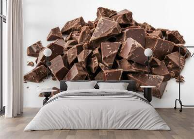 Chocolate pieces are isolated on a white backdrop. Wall mural