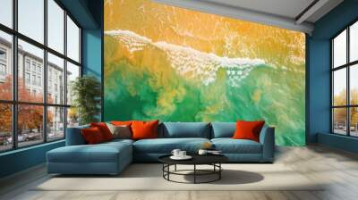 The surface of a green, yellow and blue sea in a style that merges tropical baroque, aerial view, light orange and beige tones, and minimalist photography. Wall mural