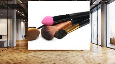 Brushes for applying face makeup isolated on white background  Wall mural