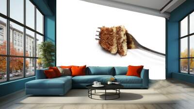 Chocolate and vanilla cake, pastry slice with metal fork isolated on white background Wall mural