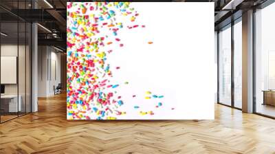 Colorful candy sprinkles isolated on white background Wall mural