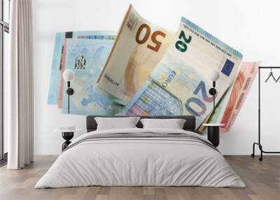 Euro banknotes with change, cash money and coins isolated on white background Wall mural