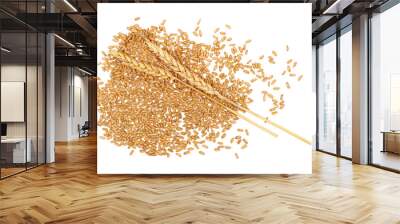 Organic peeled spelt grains and ear of wheat isolated on white, top view Wall mural