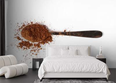 pile cocoa powder with metal spoon isolated on white background Wall mural