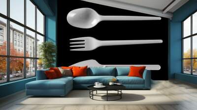 set plastic white fork, knife and spoon isolated on black background, top view, clipping path Wall mural