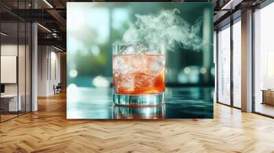 A mesmerizing image of a glass with a glowing cocktail, featuring ice cubes glistening in the sunlight, creating a stunning visual effect with steam rising. Wall mural