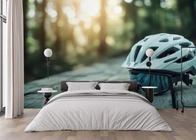 A pristine white helmet with integrated goggles rests on a wooden table, surrounded by a tranquil forest setting, evoking spirit of outdoor exploration. Wall mural