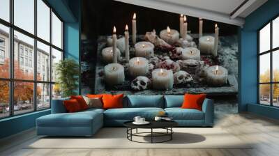 An arrangement of dimly lit candles interspersed with skulls, set on an ash-covered surface, imparting a haunting, yet reflective mood, in a mystical setting. Wall mural