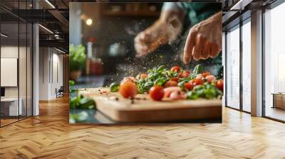 In a bustling kitchen scene, a cook adds final herbs to a vibrant mix of vegetables on a cutting board, illustrating culinary artistry and precision. Wall mural