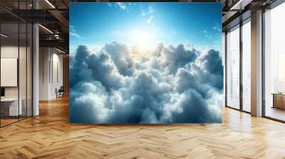 The sun breaks through a vibrant sky filled with lush cloud formations, symbolizing hope and renewal as it illuminates the vastness of the skyscape. Wall mural