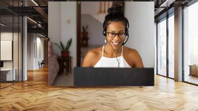 Young brazilian woman working from home Wall mural