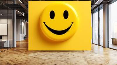 a yellow smiley face on a yellow surface Wall mural