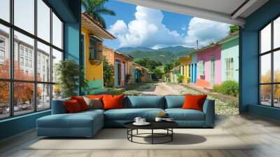 A colorful row of houses with a dirt road in between Wall mural