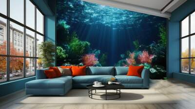 A deep blue ocean with a bright sun shining through the water. The sun is casting a beautiful light on the coral and the fish swimming around. The scene is peaceful and serene Wall mural