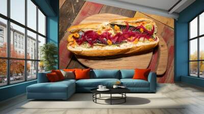 A delicious Grilled Mackerel fish Baguette on a wooden kitchen table top Wall mural