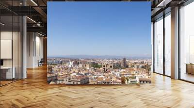 Aerial drone photo of the city centre of the Spanish city of Valencia in the Summer time showing an aerial view of the historical old buildings in the centre on a sunny day Wall mural