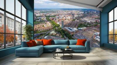 Aerial photo of the city centre of Leicester in the UK showing houses and apartment building on a sunny summers day Wall mural