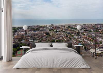 Aerial photo of the town of Worthing, large seaside town in England, and district with borough status in West Sussex, England UK, showing typical housing estates and businesses on a bright sunny day Wall mural