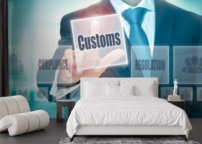 A businessman selecting a Customs Concept button on a clear screen. Wall mural