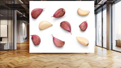 A collection of garlic cloves isolated on a flat background. Wall mural