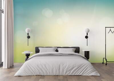 A fresh spring blue sunny sky background with blurred warm sunny glow. Wall mural