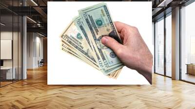 A hand holding, giving or paying American dollars in 10 and 20 banknotes, paper currency, isolated against a transparent background. Wall mural