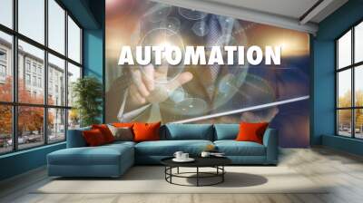 A hand selecting a Automation business concept on a futuristic computer display. Wall mural