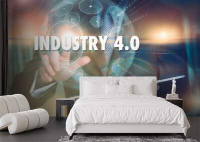 A hand selecting a Industry 4.0 business concept on a futuristic computer display. Wall mural