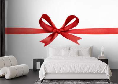 A large red ribbon bow in the centre of a long straight piece of ribbon to be used as a birthday or Christmas banner, border isolated against a transparent background Wall mural